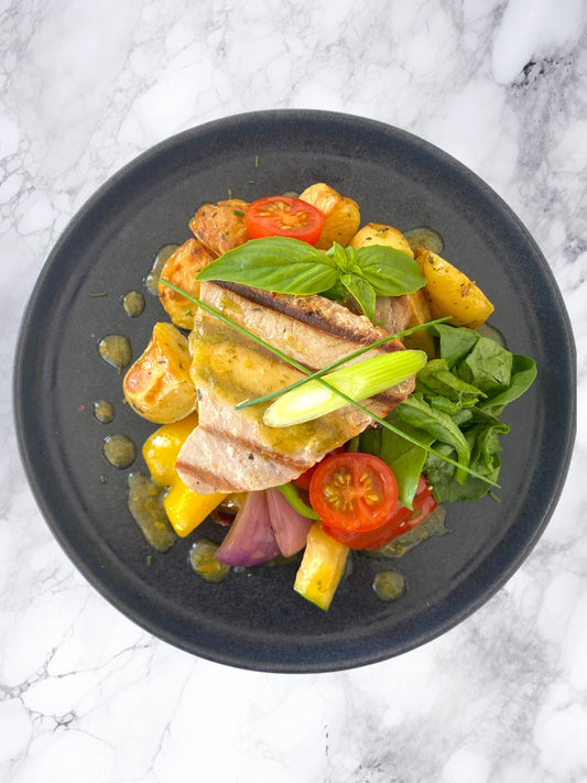 Mediterranean Tuna Steak with Baby Potatoes and Roasted Veg