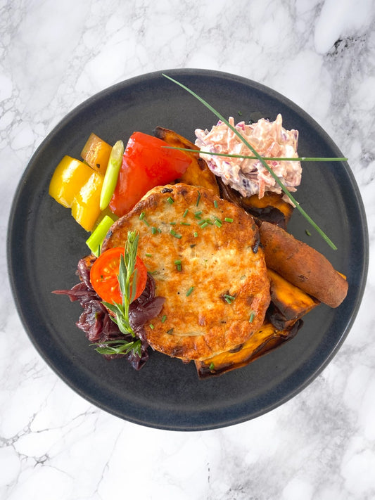 Naked Chicken Burger with Caramelised Onion, Sweet Potato Wedges & Coleslaw