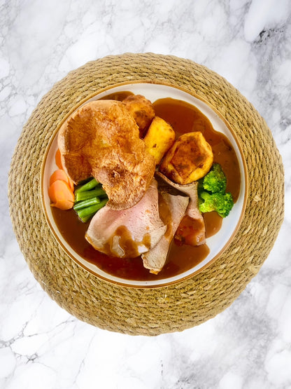 Roast Beef with Crispy Roast Potatoes and Yorkshire Pudding