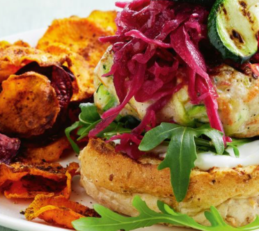 Naked Chicken Burger with Caramelised Onion, Sweet Potato Wedges & Coleslaw